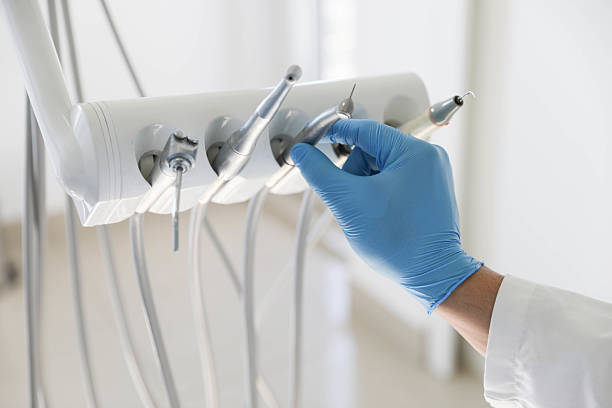 Professional Root Canal Treatment technician working in Webster Parish County, LA